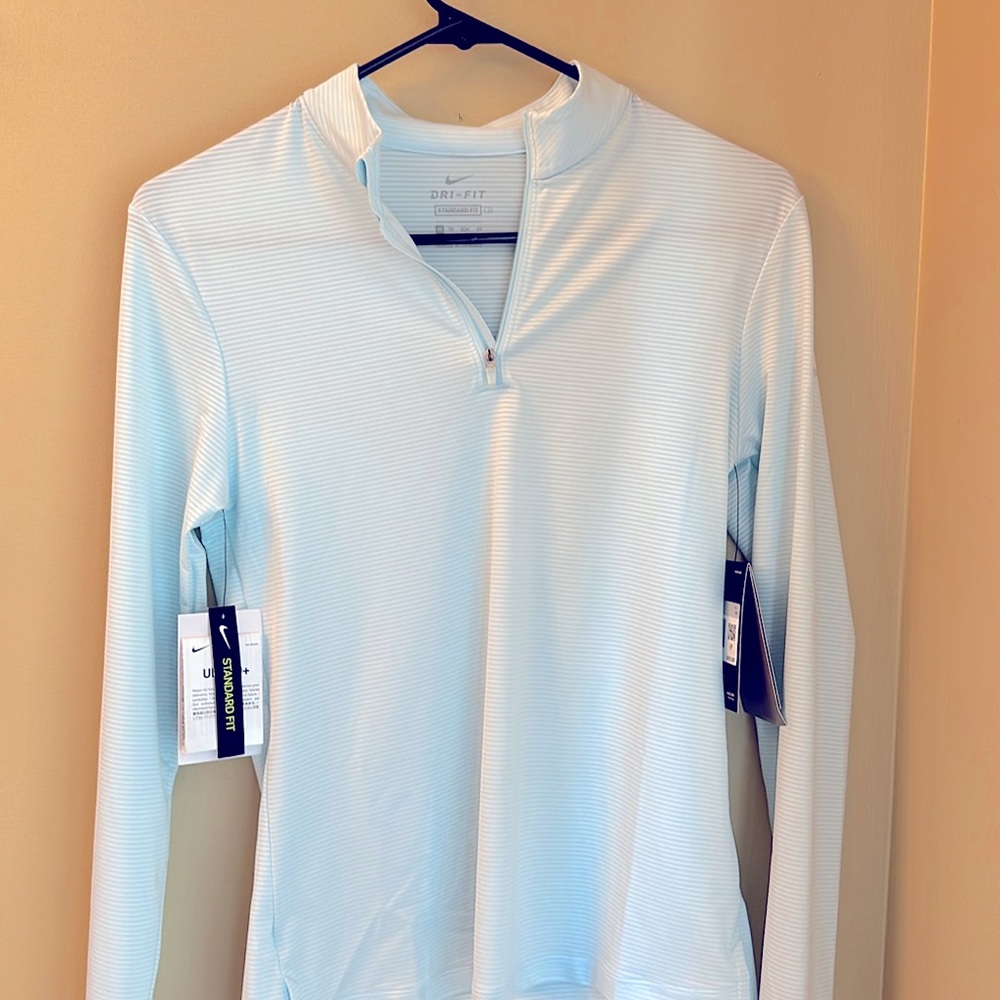 Womans Nike - Standard Fit. Mint with Silver/white lines.